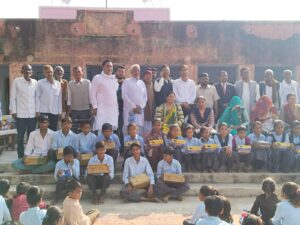 Shoes and socks distributed to students of Manfra School