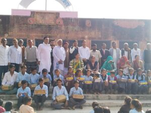 Shoes and socks distributed to students of Manfra School