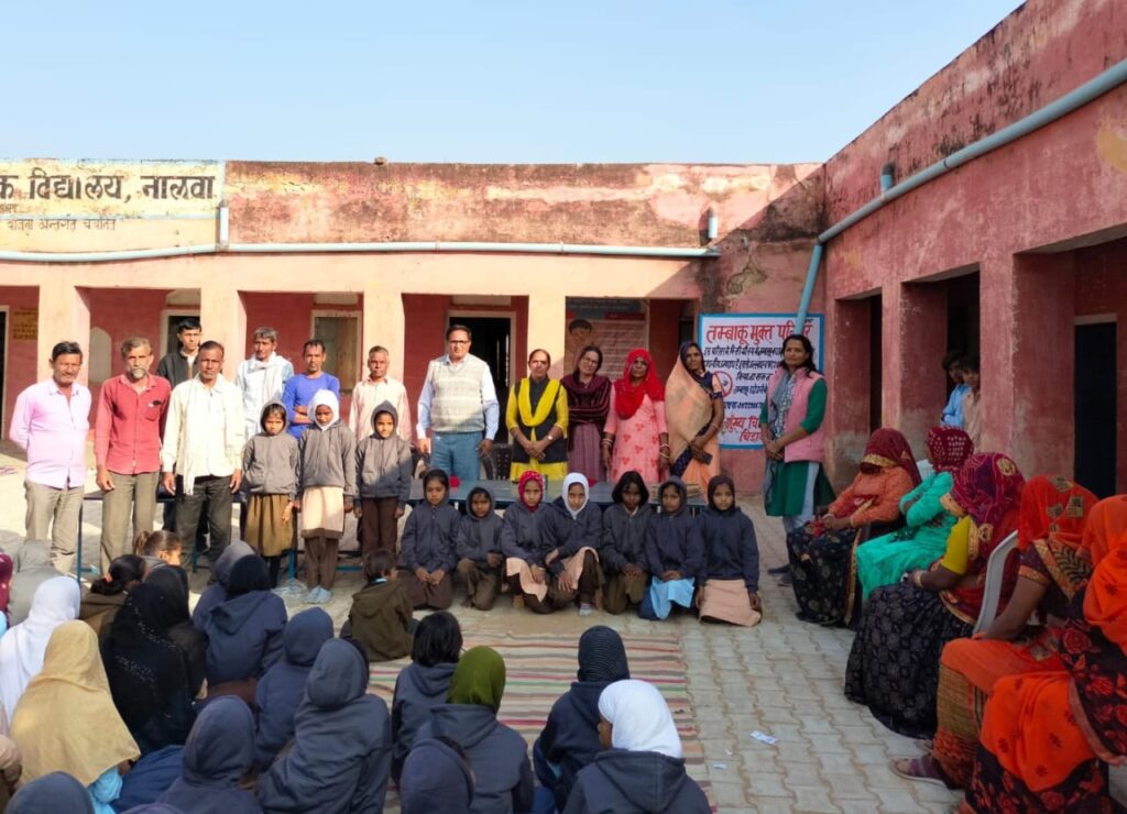 Sweater gift to the students of Government Higher Primary School, Nalwa