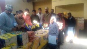 Mandrela Sarpanch distributes shoes to needy girl students on National Youth Day