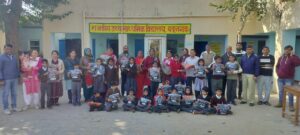 Sweaters are distributed to students in the government school of Badangarh.