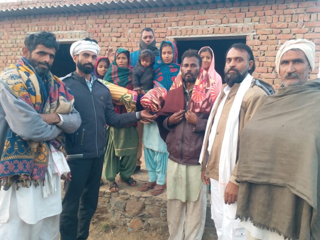 Blankets distributed by Babulal Gurjar to needy people